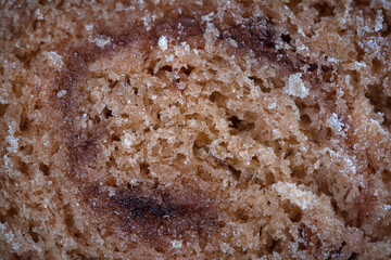 Close-up of airy sponge cake texture for background.