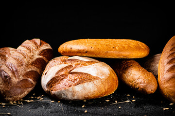 Different types of fresh bread on the table. 