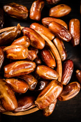 Ripe dates on a plate. 