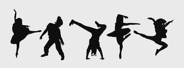 A set of men and women street dance hip hop dancers in silhouette