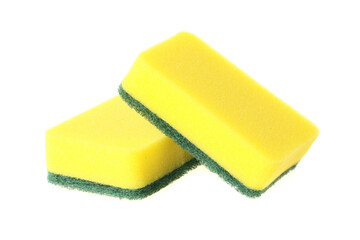 Brightly colored sponges on white background with copy space