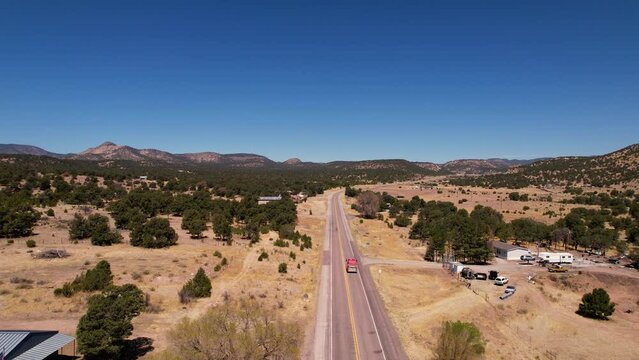 Fire truck going up highway in Datil, New Mexico.