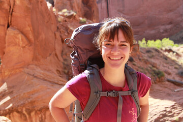 portrait of woman backpacking in Coyote Gulch Utah