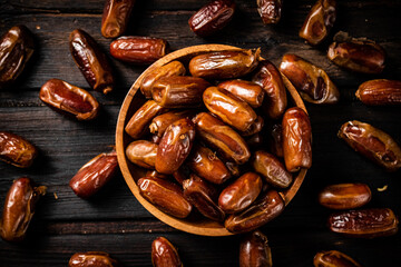 Ripe dates on a plate. 