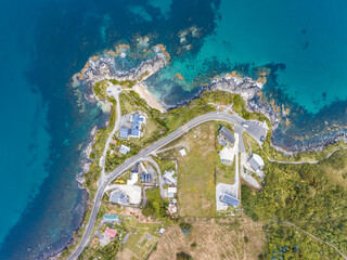 Aerial drone bird's eye view of Stirling Point, a landmark at the southern end of Bluff, a town in...