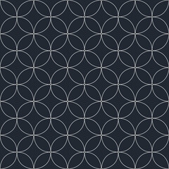 Fototapeta premium White circles seamless geometric pattern on a dark background. Vector Textures.