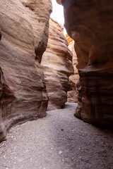 Fantastically beautiful landscape in the national nature reserve - Red Canyon in the rays of the setting sun, near the city of Eilat, in southern Israel