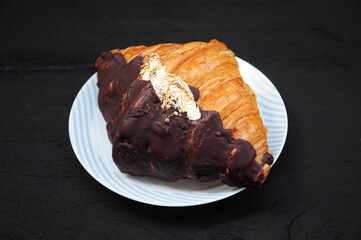 Dark Chololate Croissant on a plate