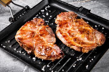 Pan fried grilled pork steak. 