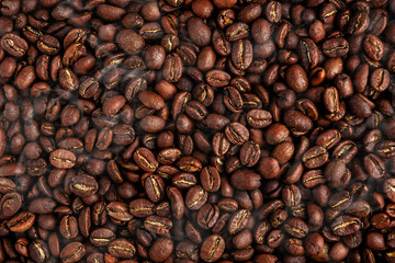 Coffee beans, food background texture and freshly roasted arabica coffee beans with smoke, top view horizontal banner
