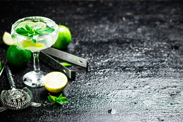 Margarita with mint and lime leaves. 