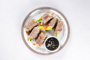 Bulgogi Rolls or Beef Rolls Stuffed with Sweet Pepper and enoki mushroom. Meat roulade.