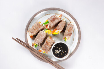Bulgogi Rolls or Beef Rolls Stuffed with Sweet Pepper and enoki mushroom. Meat roulade.