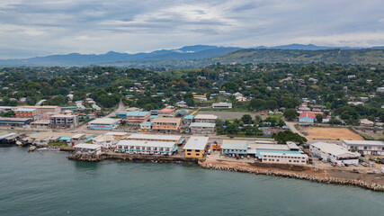 View of hotel infrastructure near the main coastal highway in Honiara.
