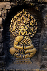 Buddha, bas-reliefs in the wall. Buddhism.