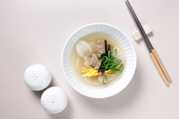 Tteokguk is Korean rice cake soup eaten on Korean New Year or Seollal.