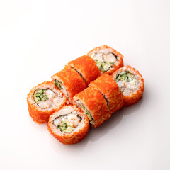 Sushi roll with crab, avocado, cucumber and tobiko caviar. Isolation on a white background. Japanese food. 