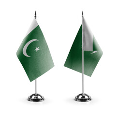 Small national flags of the Pakistan on a white background