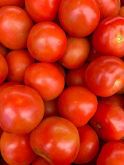 Fresh tomatoes for sale at a vegetable market