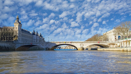 Obraz premium Paris, the pont au Change, and the Conciergerie on the ile de la Cité, on the Seine 