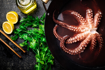 Fototapeta premium Octopus is boiled in a pot of water. 