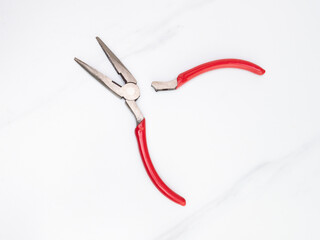 PIcture of a broken plier isolated