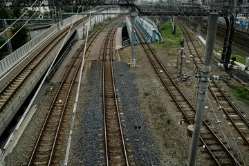 Fototapeta na wymiar railroad tracks and wires found at Ikebukuro, Tokyo | 線路と架線・池袋
