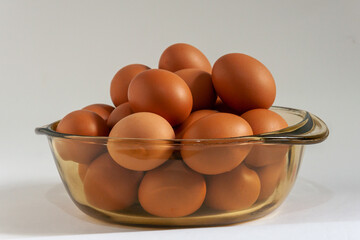 eggs in glass containers, white background