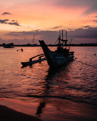 Mirissa, Sri Lanka : a traditional Sri Lankan fishing boat on the port of Mirissa at sunset