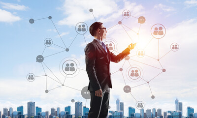 Concept of business success and control with confident boss against cityscape background