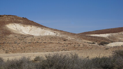 The view of the Hatzaz Water Holes from the hiking trail close to the religious community settlement Merhav Am in the Negev desert in Israel in the month of January
