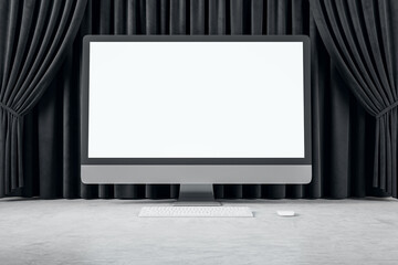 Empty white mock up computer monitor, black curtains and concrete flooring. Cinema, stage and theater. 3D Rendering.