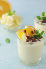 Orange lemon citrus milk mousse in glasses
