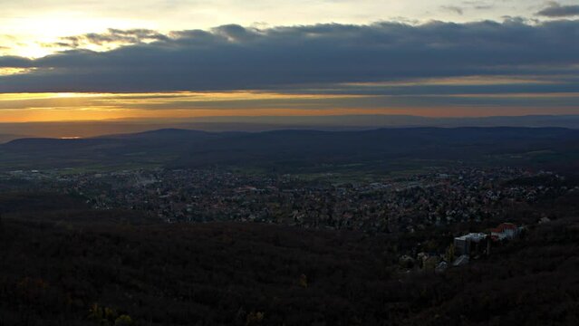 sun, rise, dawn, sky, orange, house, town, small, village, cloud, smoke, morning, afternoon, dusk, orient, aurora, atmosphere, hill, horizont, time lapse, fast, move, landscape