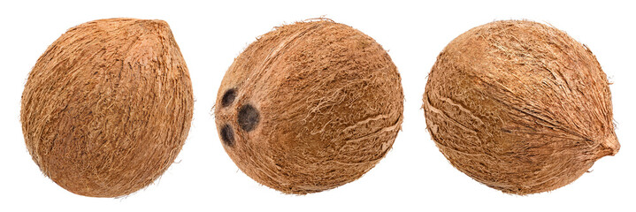 Set of entire delicious coconuts, isolated on white background