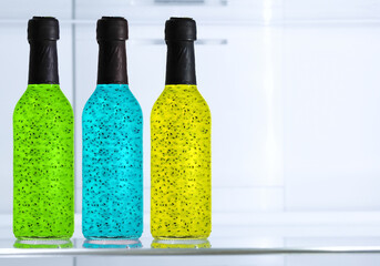 Natural energy drink in the refrigerator Chia fresca, infused water or lemonade. Basil seeds beverage with orange and tropical juice. Healthy detox cocktail for lose weight.