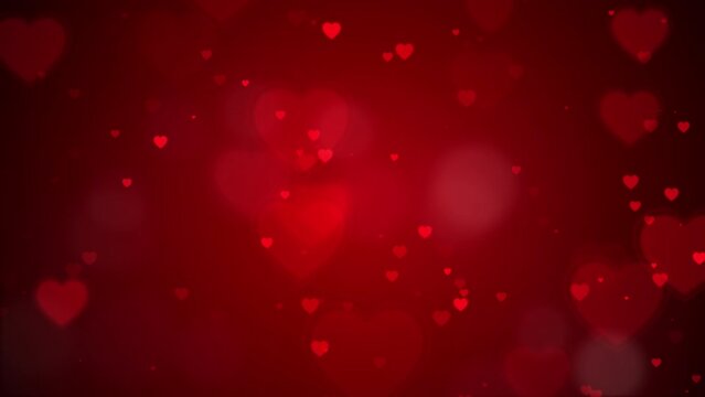 Loop video, Red Hearts motion and bokeh for Valentine's day Greeting love video. 4K Romantic looped animation on dark red background for Valentine's day.