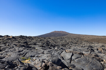 Views across the black lava volcano field of Jabal Qidr in the Harrat Khaybar region, north west Saudi Arabia