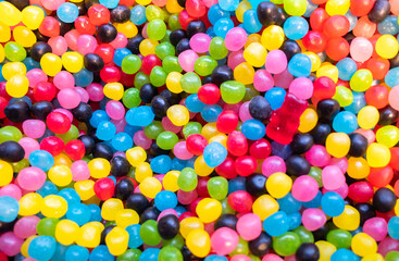 Fototapeta na wymiar Background image made of colorful candies and sweets