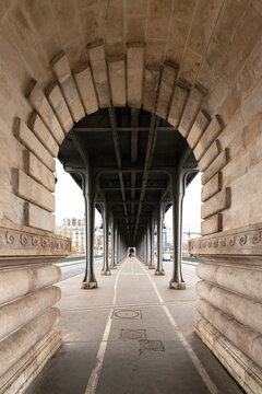 France, Ile-de-France, Paris, Underside of Pont de Bir-Hakeim with arch in foreground