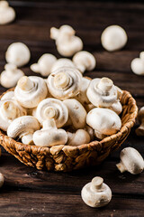 Fresh mushrooms in a basket. 