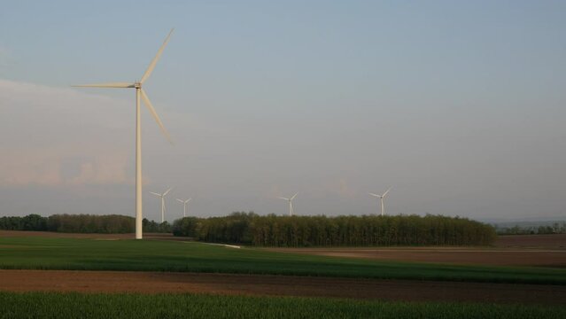 renewable energy, wind turbines, wind farm, solar panels, solar, energy, windmill, wind, energy, sun, sky, alternative energy, device, electric lines, electricity, field, grass, kinetic energy
