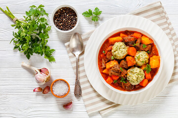 Beef Stew with Dumplings in bowl, top view