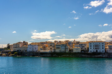 Fototapeta na wymiar Panorama Corfu town from the sea. Old town buildings of Kerkyra island