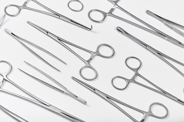 Surgical instruments on a white.