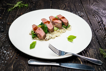 rice with meat and baby spinach
