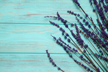 Lavender flowers on wooden background