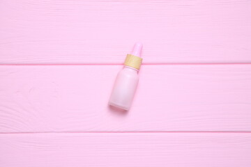 Pink cosmetic bottle mockup, skin care package