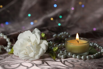 white beautiful rose with candles. romantic. copy space