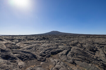 Views across the black lava volcano field of Jabal Qidr in the Harrat Khaybar region, north west Saudi Arabia
